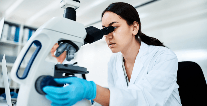 woman-looking-through-microscope
